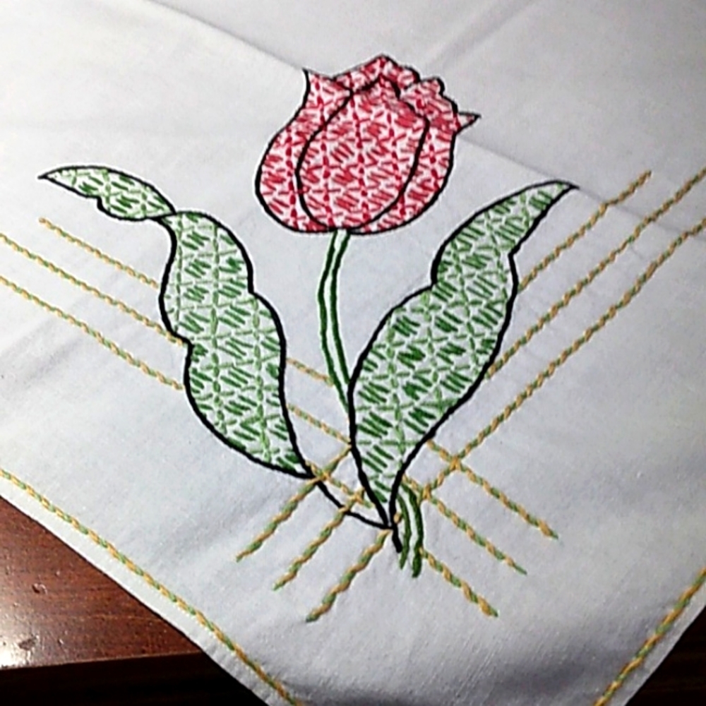 Hand Embroidered tulips on a vintage luncheon cloth with a farmhouse flair.